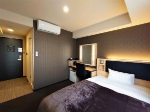 Postelja oz. postelje v sobi nastanitve Green Rich Hotel Matsue Station Across - Artificial hot spring Futamata Yunohana