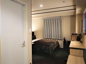 Postelja oz. postelje v sobi nastanitve Green Rich Hotel Matsue Station Across - Artificial hot spring Futamata Yunohana
