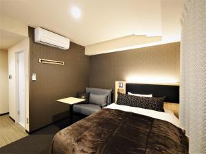 Postelja oz. postelje v sobi nastanitve Green Rich Hotel Matsue Station Across - Artificial hot spring Futamata Yunohana