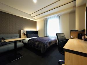 Postelja oz. postelje v sobi nastanitve Green Rich Hotel Matsue Station Across - Artificial hot spring Futamata Yunohana