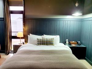 Ένα ή περισσότερα κρεβάτια σε δωμάτιο στο JS Boutique Hotel