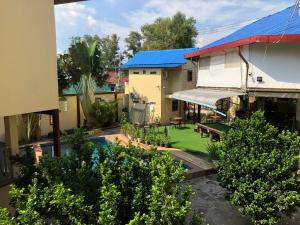 an aerial view of a building with a yard at Sofinny Motel 2 in Sihanoukville