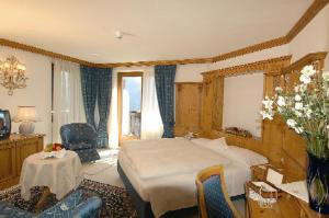 Ένα ή περισσότερα κρεβάτια σε δωμάτιο στο Hotel Lorenzetti