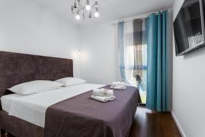 Postel nebo postele na pokoji v ubytování Villa Mare's 1