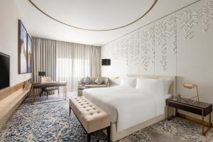 Ένα ή περισσότερα κρεβάτια σε δωμάτιο στο Steigenberger Hotel Doha