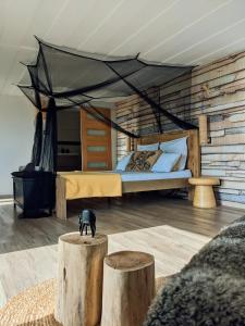 Letto o letti in una camera di A LA KAZ TI ZOZEFF