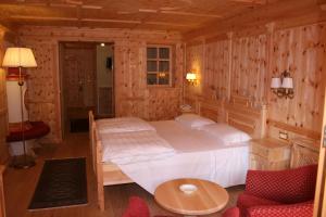 Ένα ή περισσότερα κρεβάτια σε δωμάτιο στο Hotel Lorenzetti