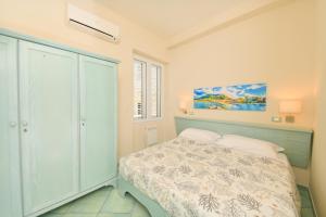 Postel nebo postele na pokoji v ubytování Albergo Atlantic