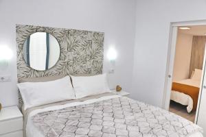 Ένα ή περισσότερα κρεβάτια σε δωμάτιο στο Apartamento Isabella Vejer