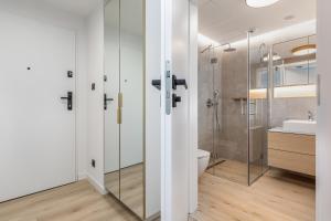 Koupelna v ubytování Premium Apartament PINEA Pobierowo + 12 fotografií