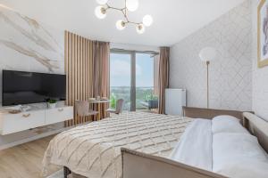 Postel nebo postele na pokoji v ubytování Premium Apartament PINEA Pobierowo