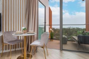 Balkón nebo terasa v ubytování Premium Apartament PINEA Pobierowo