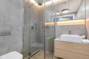 Koupelna v ubytování Premium Apartament PINEA Pobierowo