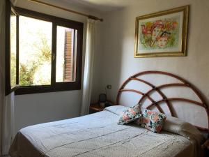 Posteľ alebo postele v izbe v ubytovaní Guest Host - Two Apartments in Aldiola Porto Rotondo + 37 fotografií