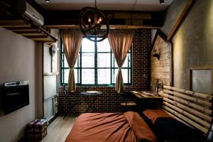 Ένα ή περισσότερα κρεβάτια σε δωμάτιο στο Hinoki Mansion