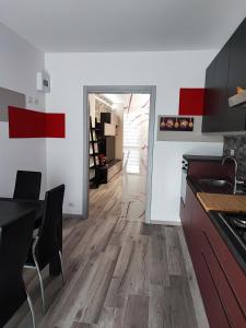 Kuchyň nebo kuchyňský kout v ubytování CASA ASSIETTA