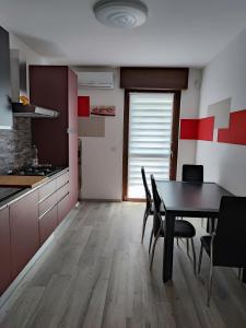 Kuchyň nebo kuchyňský kout v ubytování CASA ASSIETTA