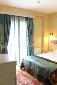 Cama o camas de una habitación en Hotel Novano