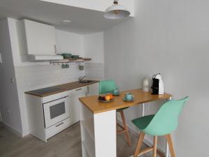 Kuchyňa alebo kuchynka v ubytovaní Aqua Apartment