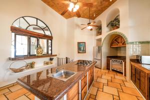 Kuchyň nebo kuchyňský kout v ubytování 1086 - Villa Encantada