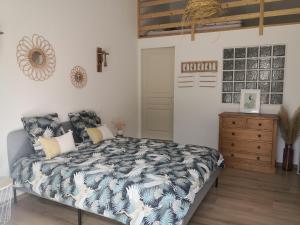 Postel nebo postele na pokoji v ubytování Le Mas Paolo