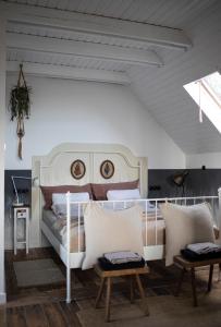 Postel nebo postele na pokoji v ubytování Vulkán Nyúlontúl
