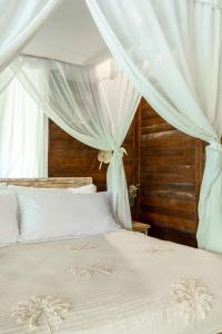 Postel nebo postele na pokoji v ubytování Tigerlillys Boutique Hotel