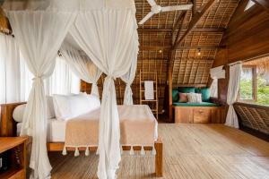 Postel nebo postele na pokoji v ubytování Tigerlillys Boutique Hotel