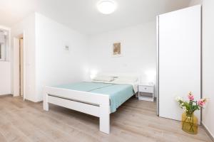 Postel nebo postele na pokoji v ubytování Apartment Morris