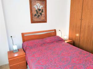 Ein Bett oder Betten in einem Zimmer der Unterkunft ACV - Isla Park-1ª Linea Planta 1 Sur