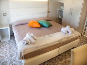 Postel nebo postele na pokoji v ubytování Riviera Mare Beach Life Hotel