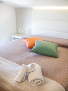 Postel nebo postele na pokoji v ubytování Riviera Mare Beach Life Hotel