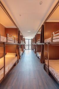 a group of bunk beds in a room at Hostelle - Women only hostel Barcelona in Barcelona