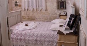 Posteľ alebo postele v izbe v ubytovaní Villa Athina - Irene Country House