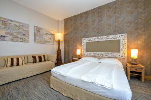 Voodi või voodid majutusasutuse Hotel Flaminia toas