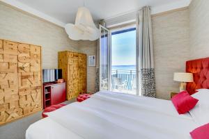 Voodi või voodid majutusasutuse Hotel Flaminia toas