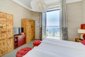 Voodi või voodid majutusasutuse Hotel Flaminia toas