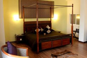 Postel nebo postele na pokoji v ubytování Hotel Maluri