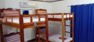 Postel nebo postele na pokoji v ubytování Seashore Inn + 36 fotografií