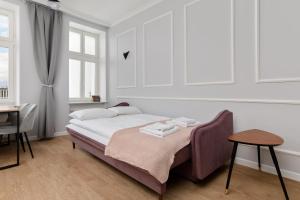 Posteľ alebo postele v izbe v ubytovaní Noakowskiego 16 - Premium Designed Apartments by Noclegi Renters