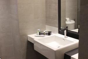 Koupelna v ubytování Hotel Maluri
