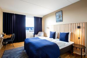 Letto o letti in una camera di Hotel Britannia