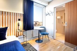 Letto o letti in una camera di Hotel Britannia