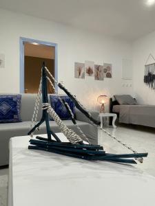 A bed or beds in a room at ARDANI BAY STUDIO FAMILY APARTMENT