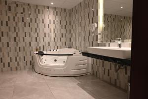 Koupelna v ubytování Quiet Dreams - Serviced Apartments King abdul Aziz Street Branch