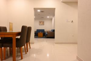 Posezení v ubytování Quiet Dreams - Serviced Apartments King abdul Aziz Street Branch