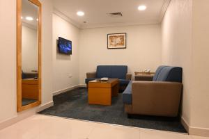 TV a/nebo společenská místnost v ubytování Quiet Dreams - Serviced Apartments King abdul Aziz Street Branch