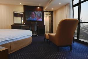 TV a/nebo společenská místnost v ubytování Quiet Dreams - Serviced Apartments King abdul Aziz Street Branch
