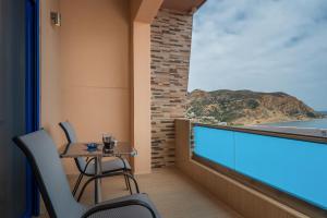A balcony or terrace at Minos Boutique Hotel