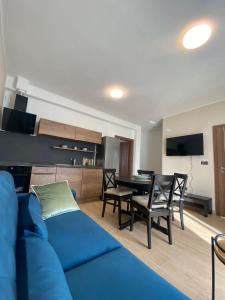 TV a/nebo společenská místnost v ubytování Apartmani Cvita